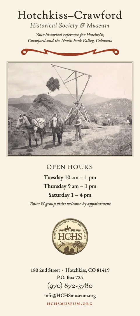 The museum's rack card: Hotchkiss-Crawford Historical Society & Museum over a photograph of a hay derrick, with its open hours and seal.