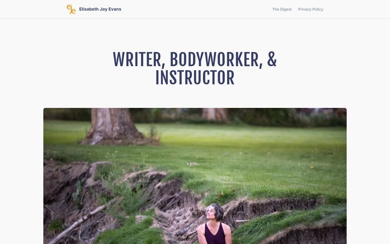 Elisabeth Joy Evans' page: the heading Writer, Bodyworker, & Instructor in tall navy capitals over a photograph of her on a riverbank.