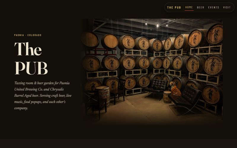 THE PUB's home page: 'The PUB' in large cream letters beside a barrel room feathered into a near-black ground.